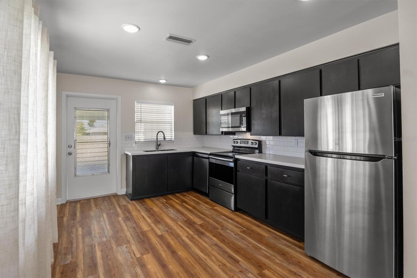Villa at 1213 8TH ST NW, WINTER HAVEN, photo 11 of 29