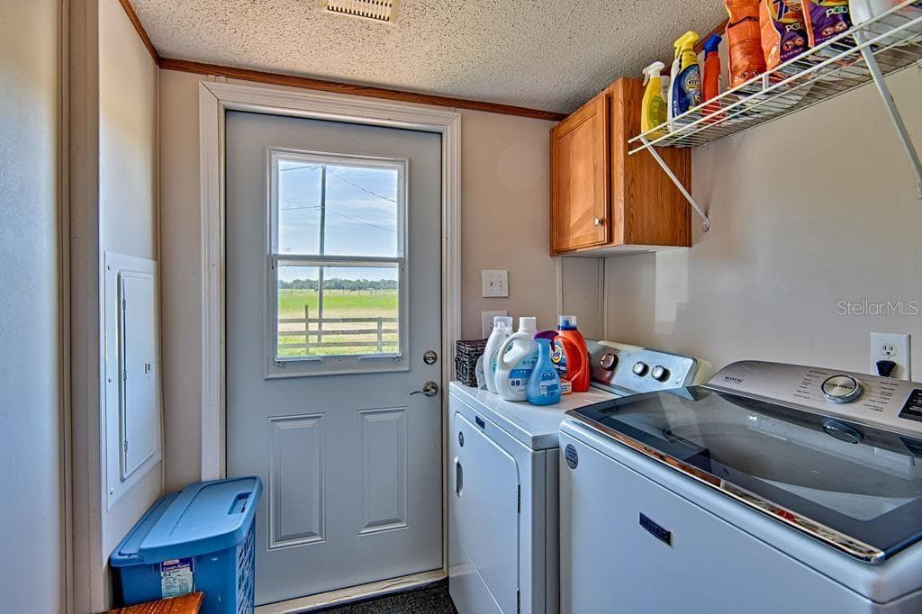 laundry room includes washer & dryer - 10250 NW 67TH PL, CHIEFLAND