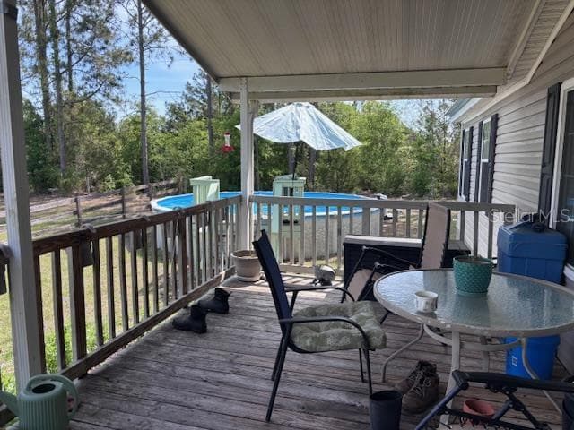 pool to left of home next to porch - 10250 NW 67TH PL, CHIEFLAND