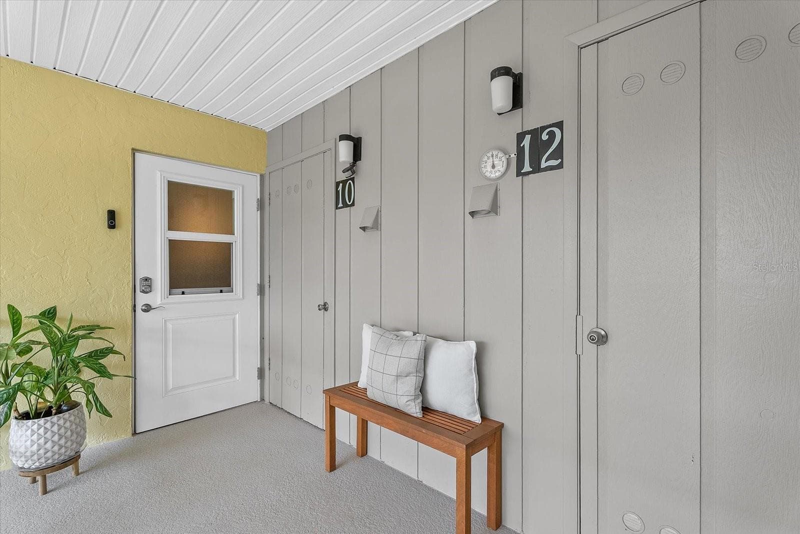 Welcoming front door with private laundry and storage - 101 LOUELLA LN #10, NOKOMIS