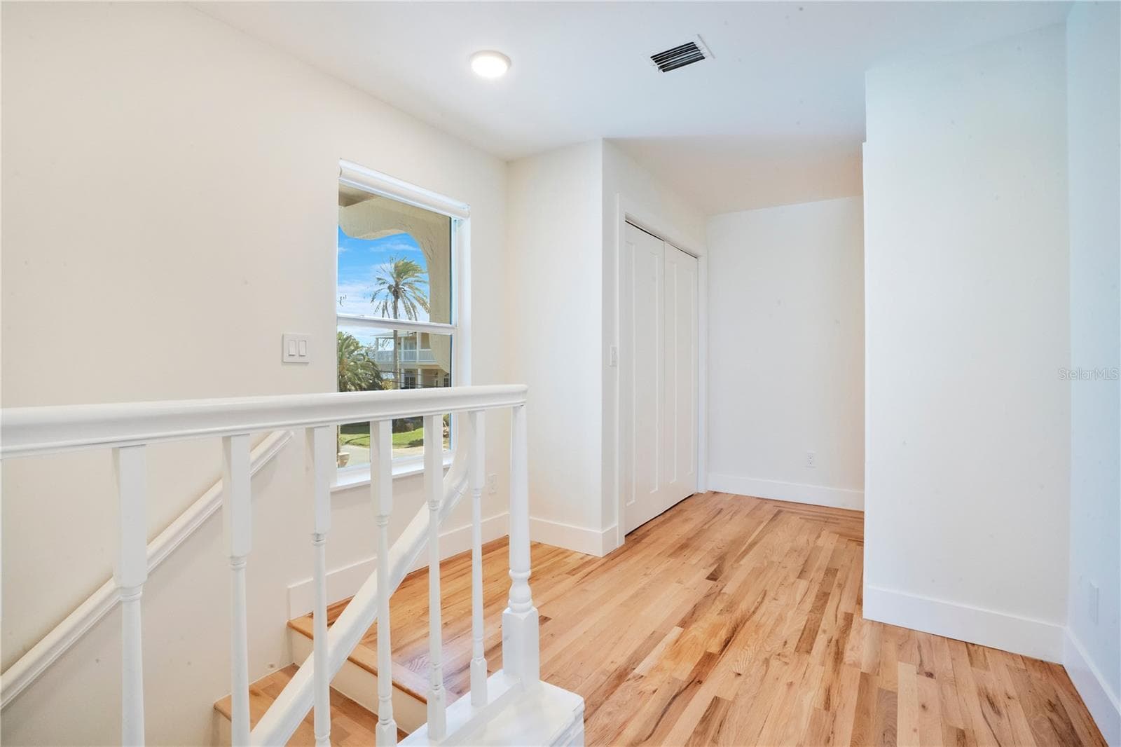 Second Floor Hallways w/ Multiple Closets - 2117 OCEAN DR, NEW SMYRNA BEACH