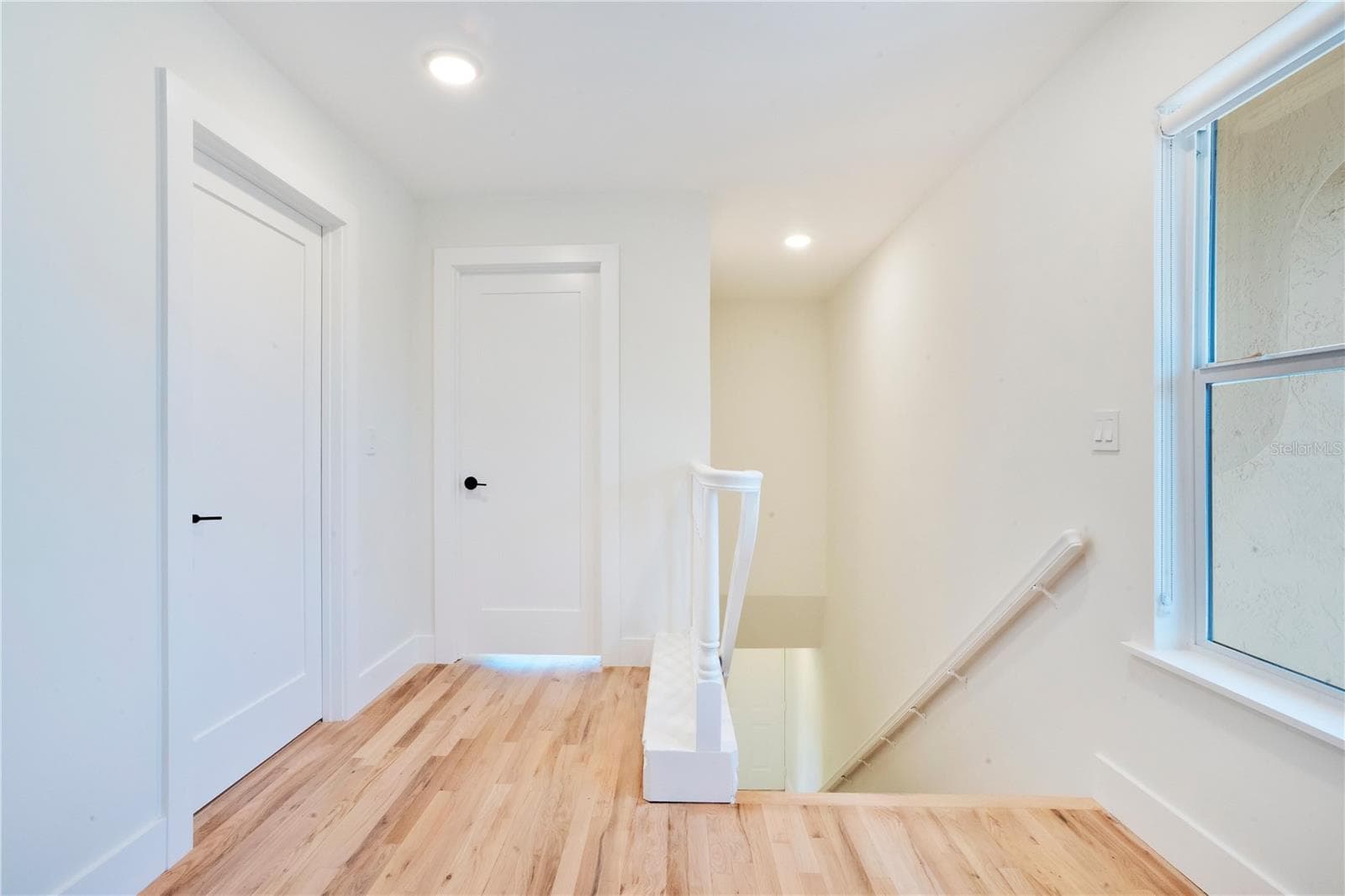 Second Floor Hallways w/ Multiple Closets - 2117 OCEAN DR, NEW SMYRNA BEACH