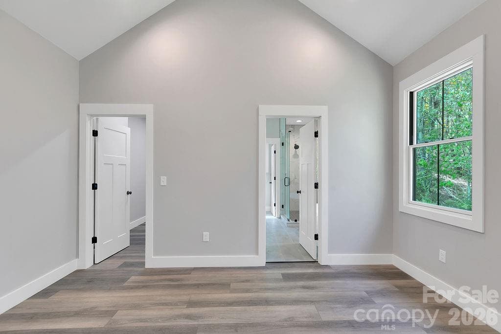 Primary Bedroom into Bath - 404 High Ridge Drive, Mills River