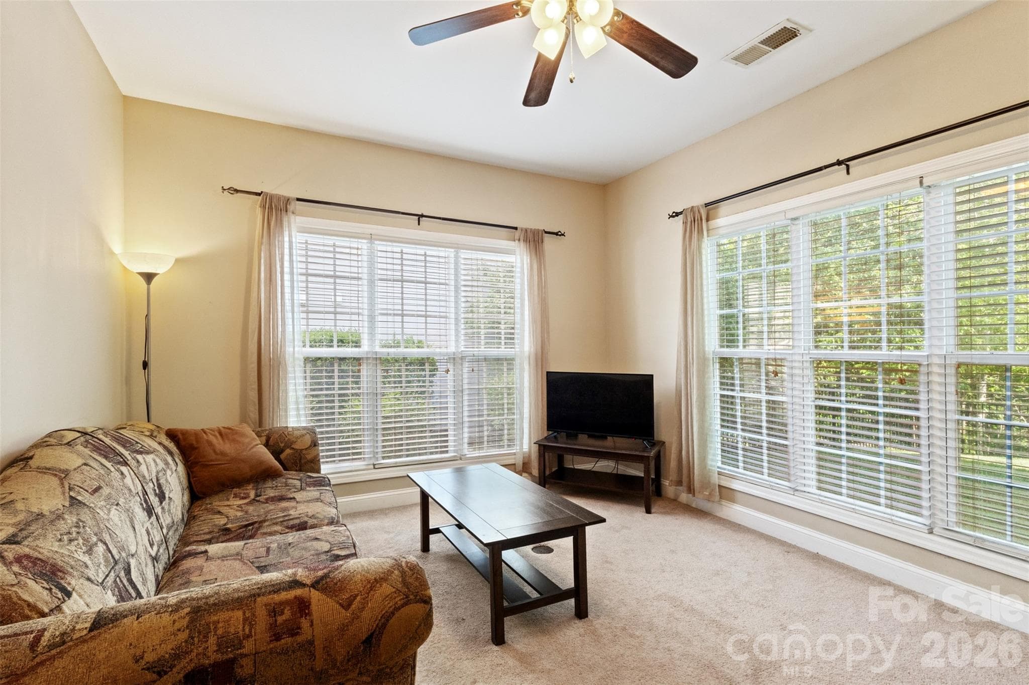 Office with Double Doors off the back of the house looking out to the Treed Rear Lot. - 8458 Mossy Cup Trail, Harrisburg