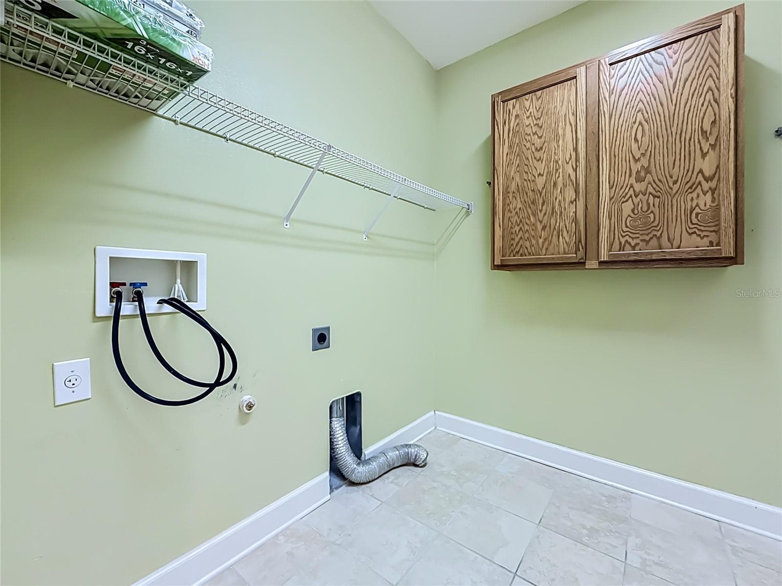 inside laundry room - 1027 ORCA CT, HOLIDAY