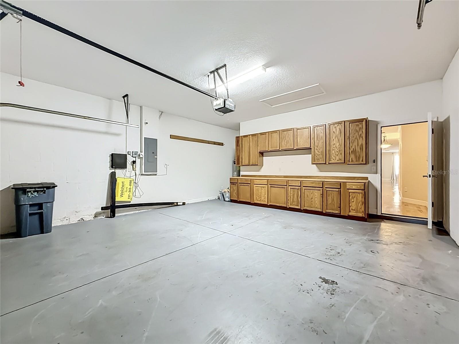 two car garage with nice storage for workshop - 1027 ORCA CT, HOLIDAY