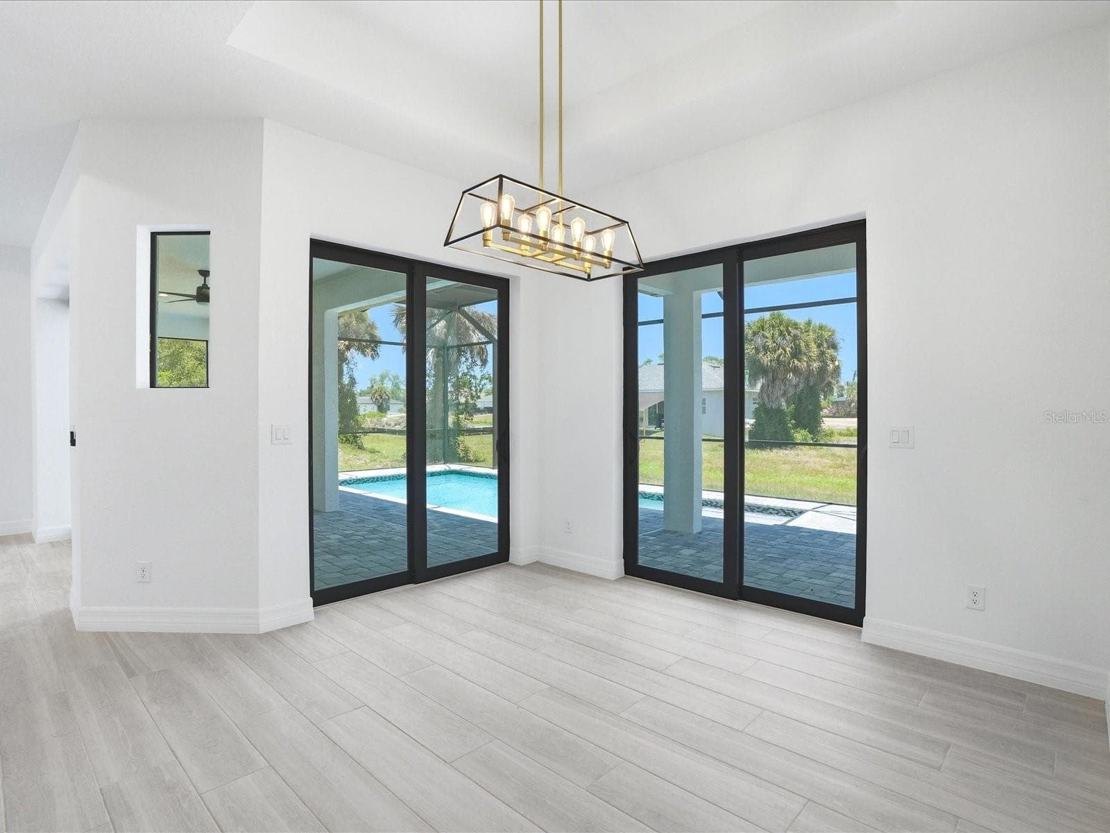 Dining Room with Double Sliders - 72 TEE VIEW RD, ROTONDA WEST