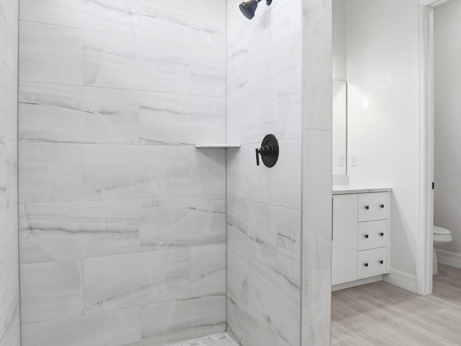 Primary Bathroom Roman Shower Right Side - 72 TEE VIEW RD, ROTONDA WEST