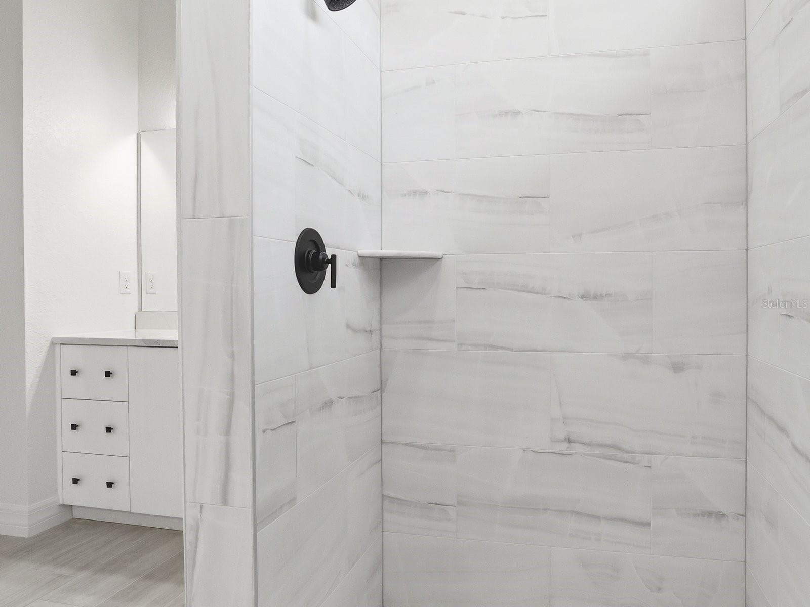 Primary Bathroom Roman Shower Left Side - 72 TEE VIEW RD, ROTONDA WEST