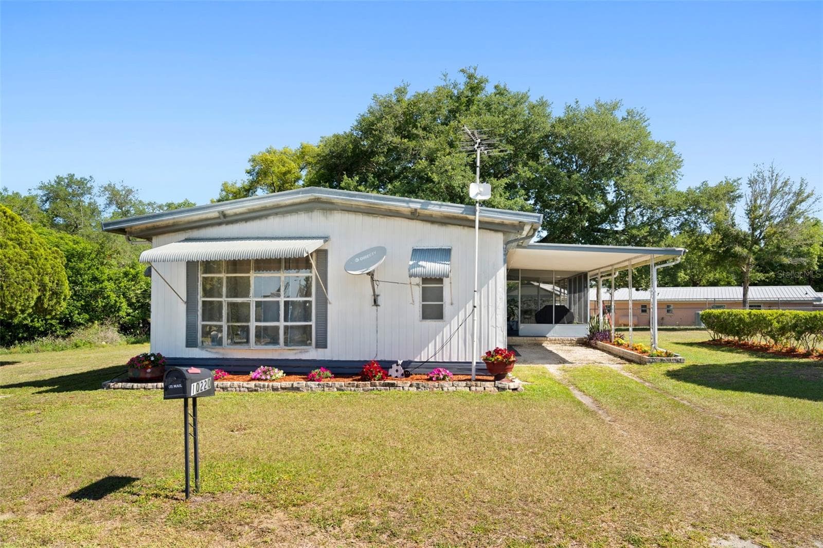 Mobile Home at 10220 WELLINGTON AVE, DADE CITY, photo 4 of 50