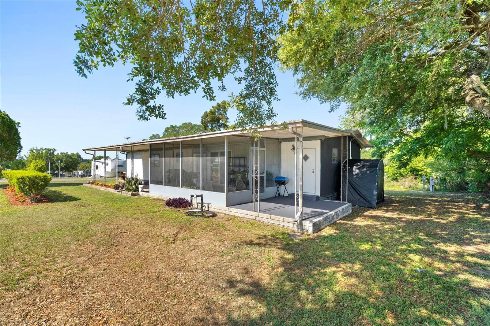 Mobile Home at 10220 WELLINGTON AVE, DADE CITY, photo 5 of 50