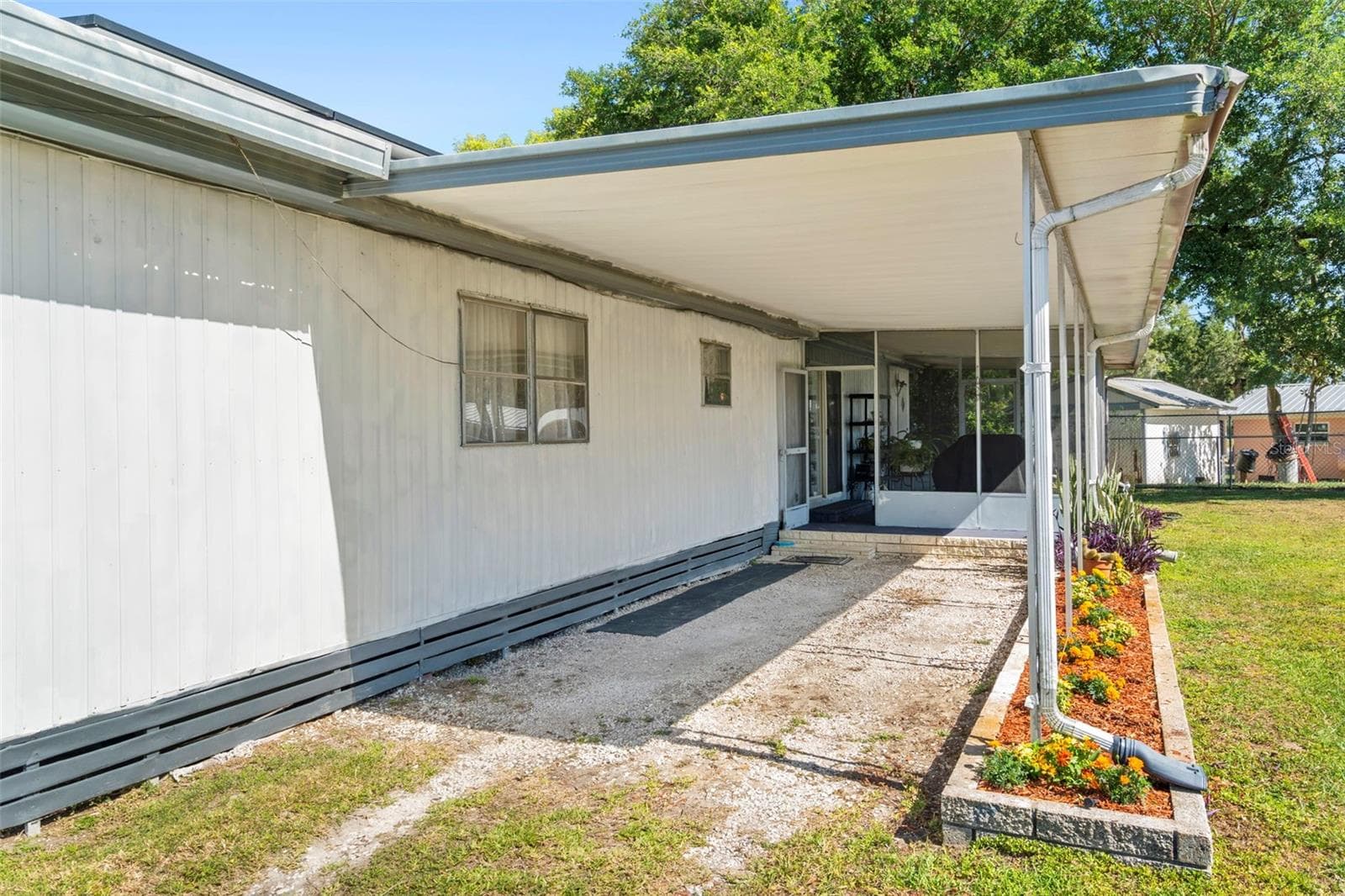Mobile Home at 10220 WELLINGTON AVE, DADE CITY, photo 8 of 50