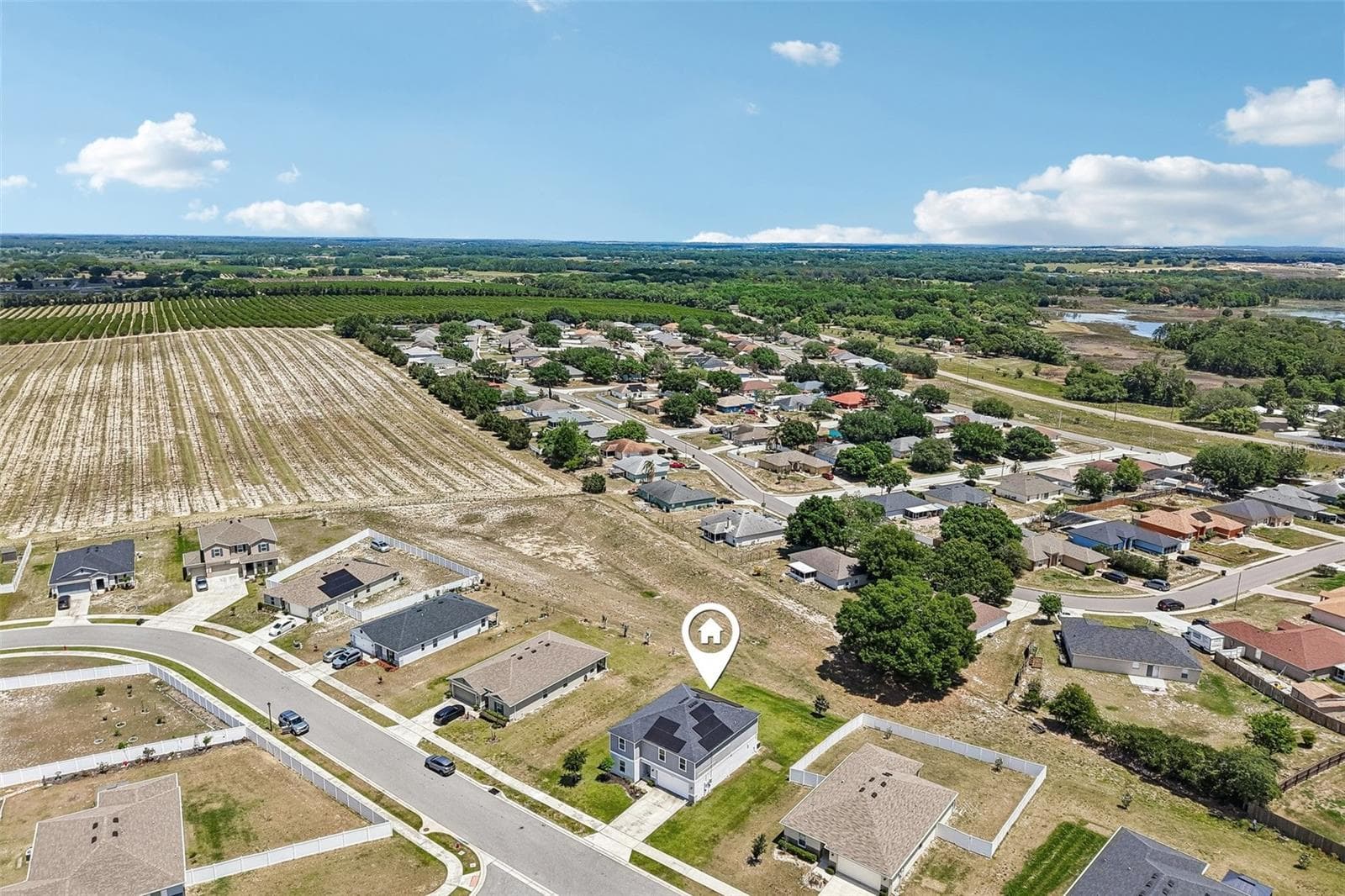 Large .24 acre lot with no immediate rear neighbors - welcome to the Gardens at Lake Jackson Ridge! - 2082 FICUS ST, MASCOTTE