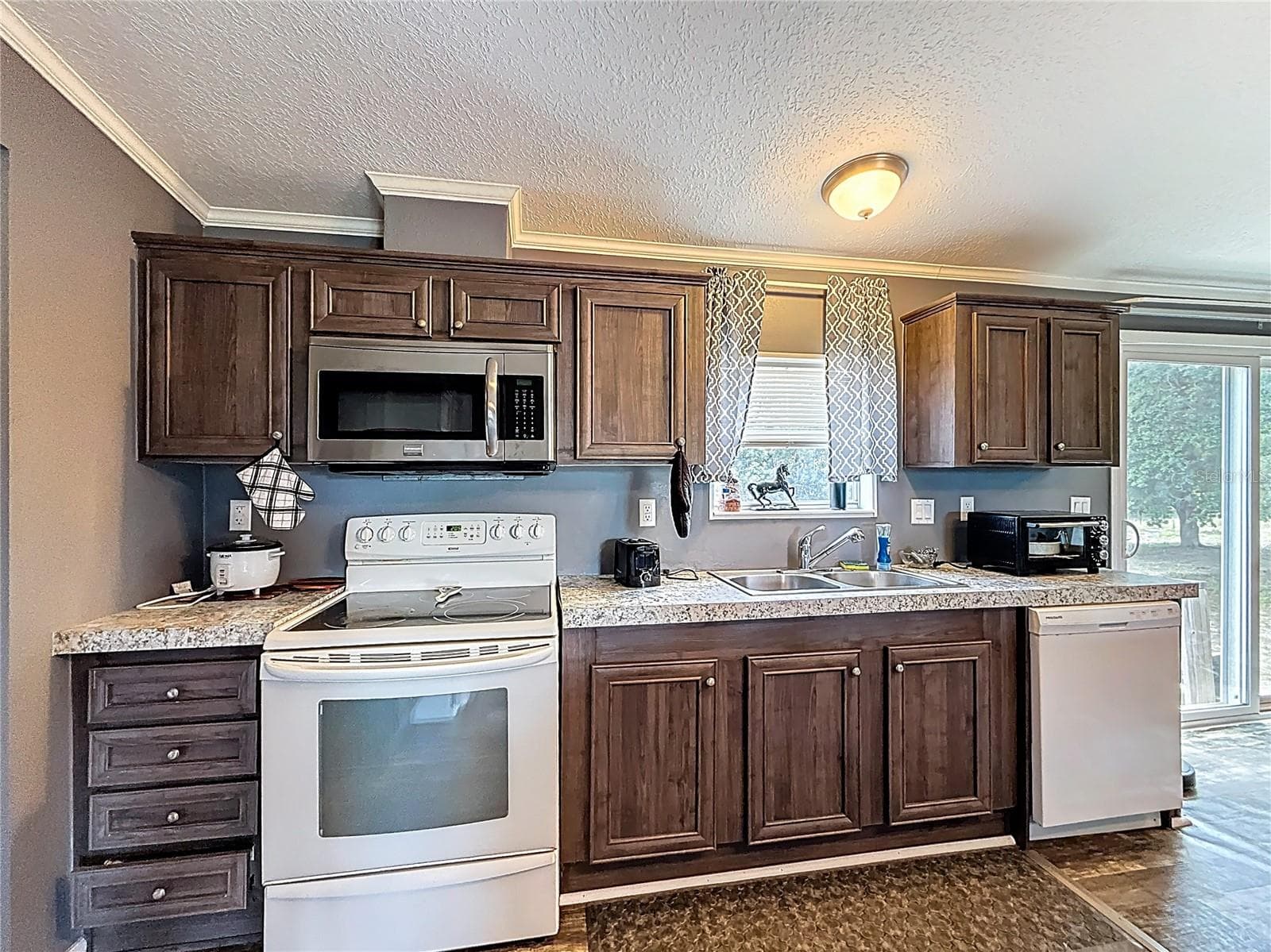 Manufactured Home at 8108 SERGEANT PEPPER DR, HOWEY IN THE HILLS, photo 17 of 36
