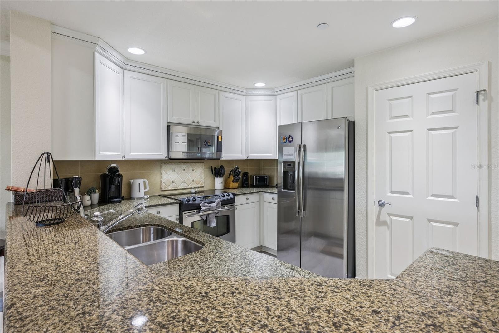 Condominium at 7602 SANDY RIDGE DR #103, REUNION, photo 12 of 61