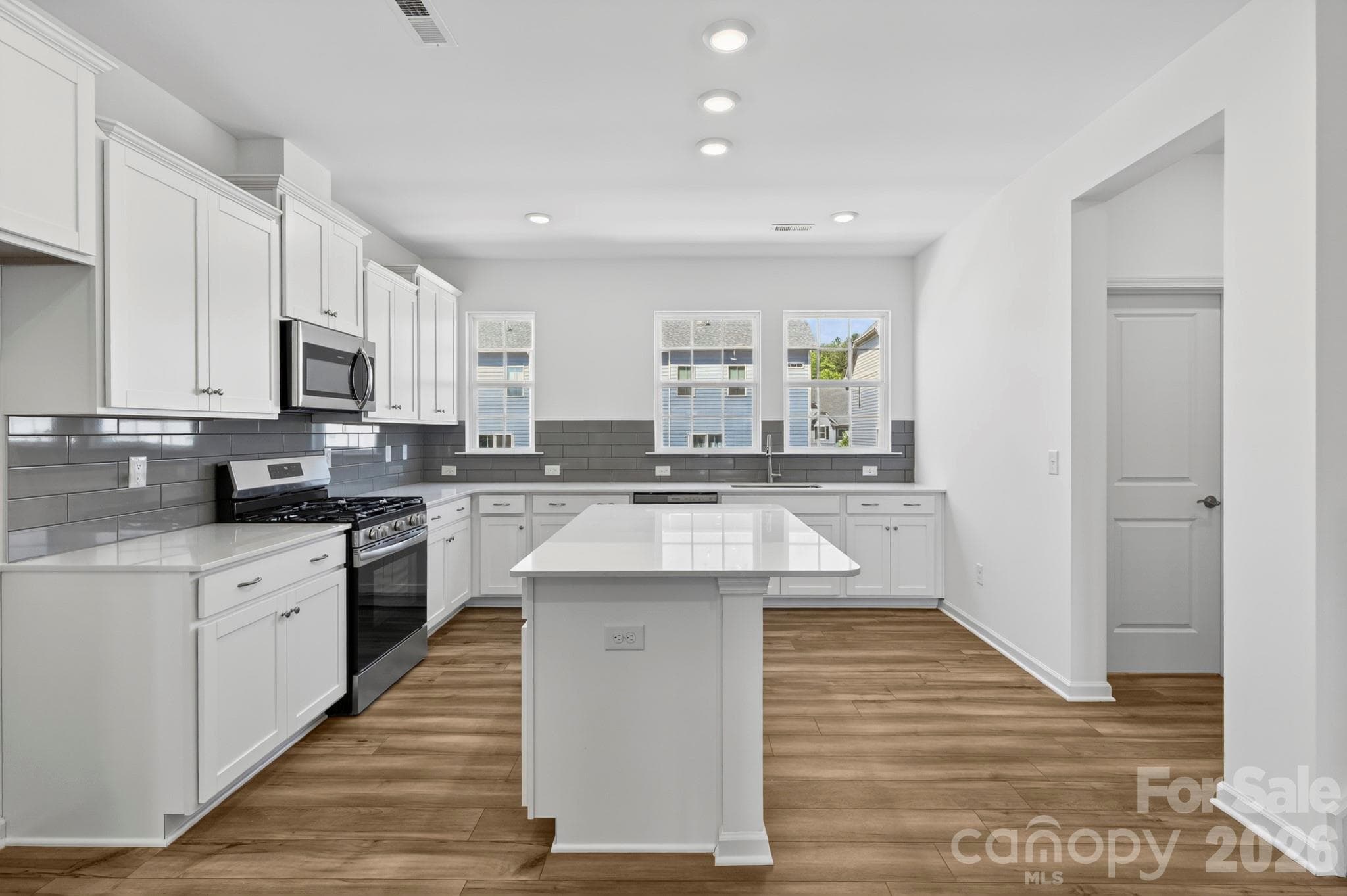 Center Island with rear kitchen - 107 Nablus Trail, Mooresville