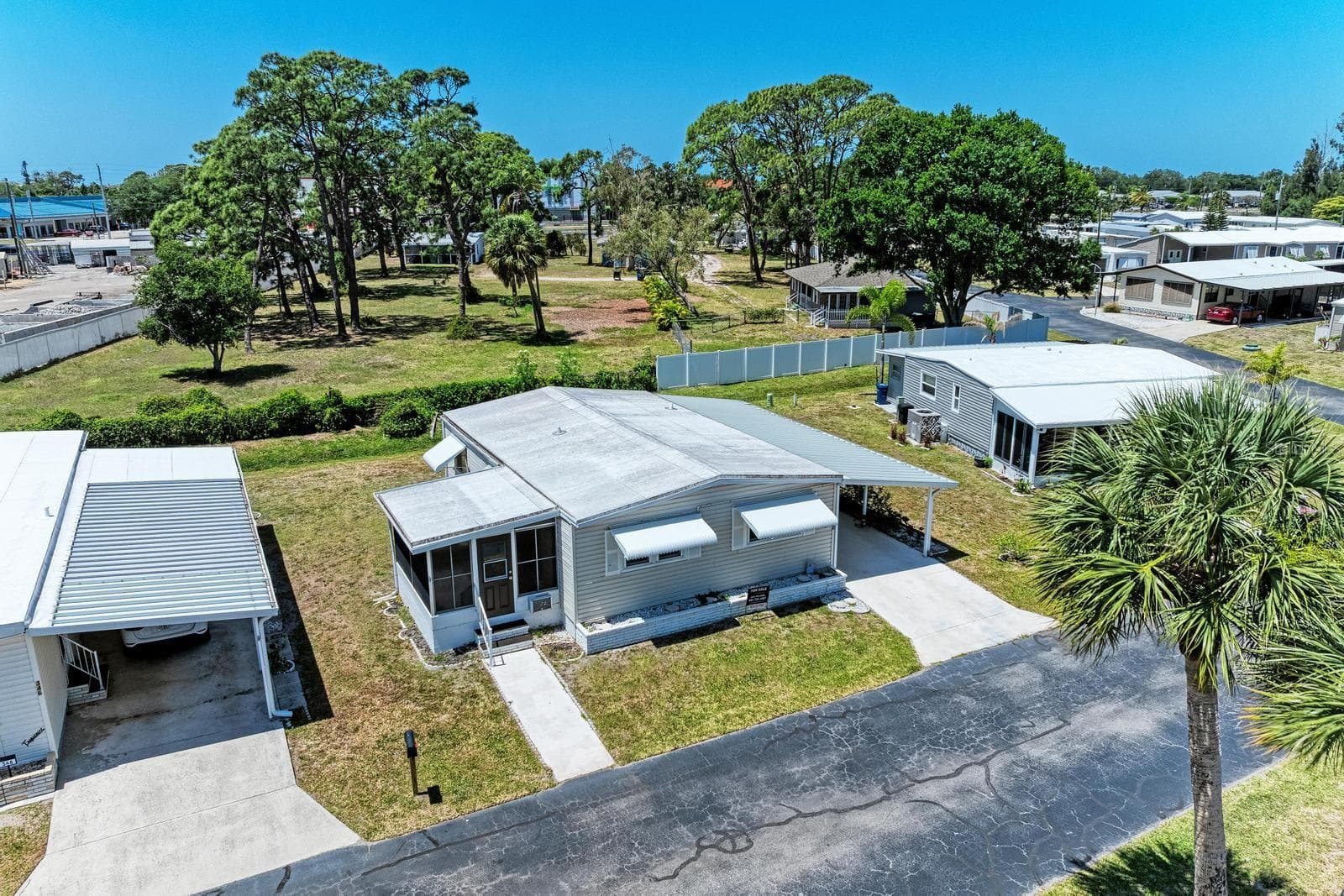 The roof is ONLY 2 YEARS OLD. Comes with 15-year warranty. - 348 TROPIC DR, OSPREY