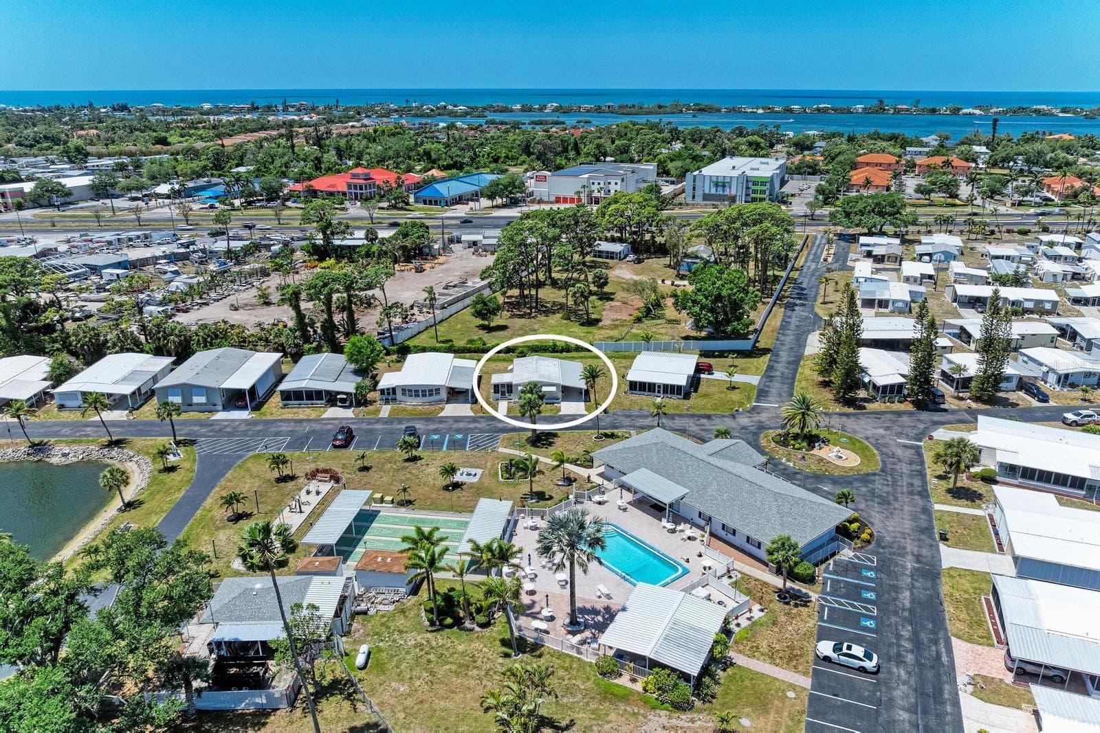 Great Location! Your home is across the street from the pool& clubhouse. - 348 TROPIC DR, OSPREY