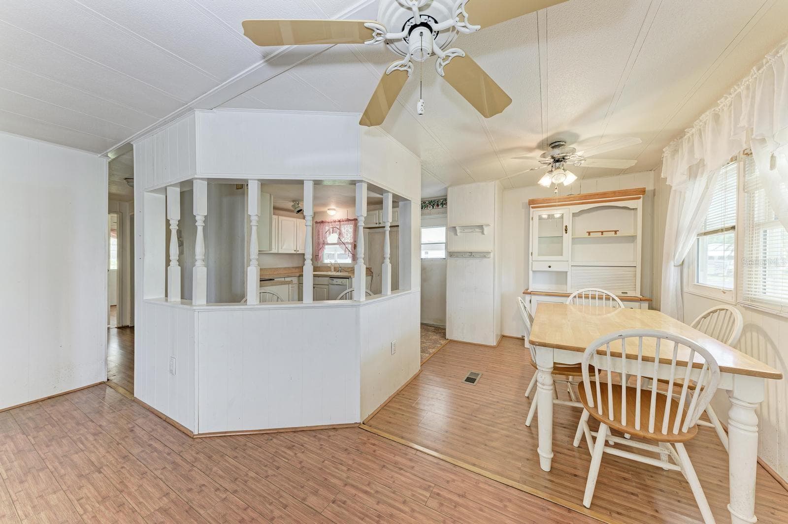 Dining area near the kitchen and the living room. - 348 TROPIC DR, OSPREY
