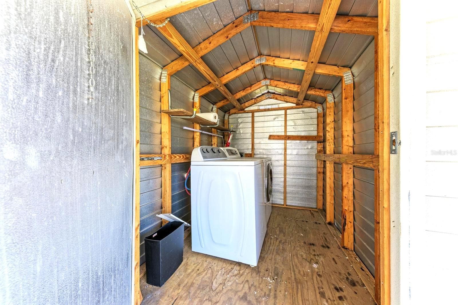 Inside the shed. washer and dryer+ storage - 348 TROPIC DR, OSPREY