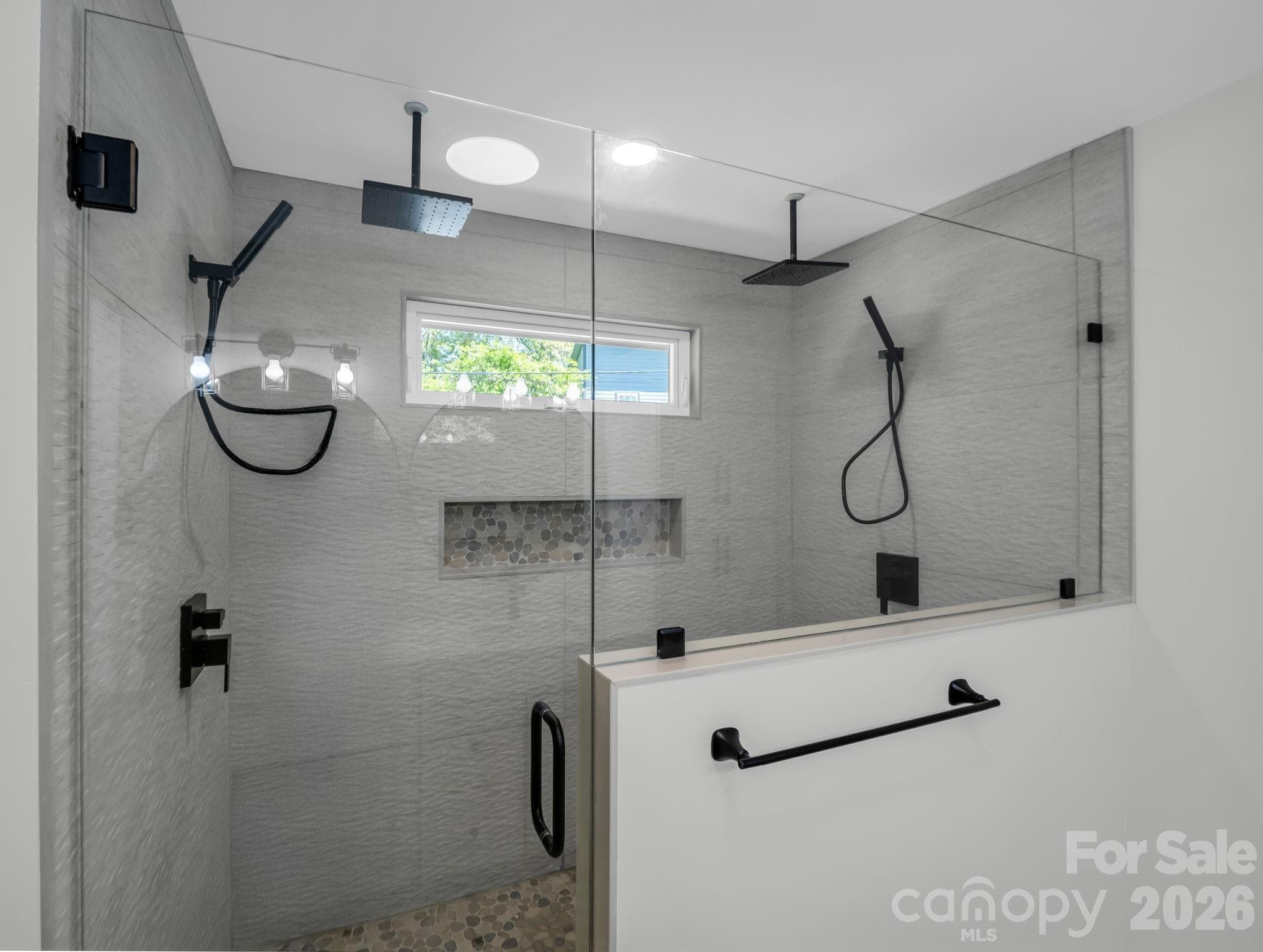 dual rainshower -Primary room ensuite full bath- main floor - 18 Worley Place, Asheville