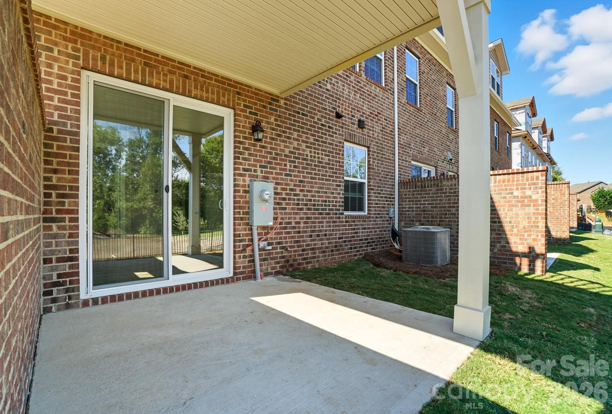representation of covered porch - actual home has different brick color - 12015 Lavinia Lane, Charlotte