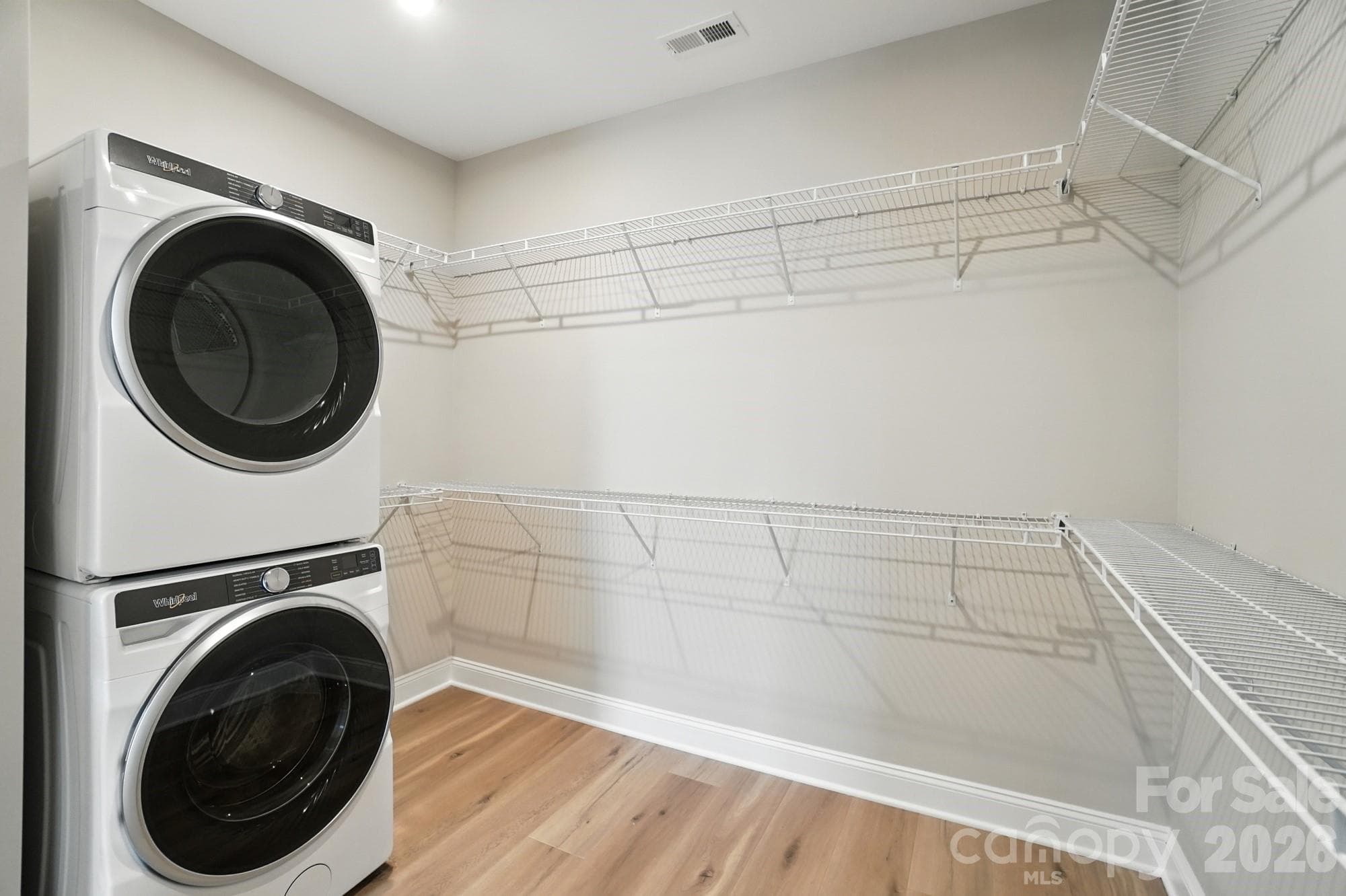 representation of primary closet with included washer/dryer - 12015 Lavinia Lane, Charlotte