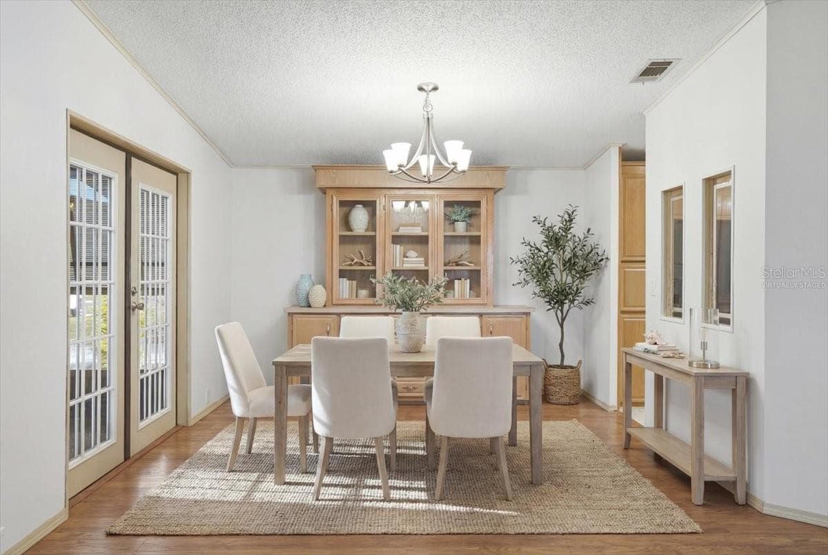 Dining room - virtually staged - 6144 REDWING AVE, ENGLEWOOD