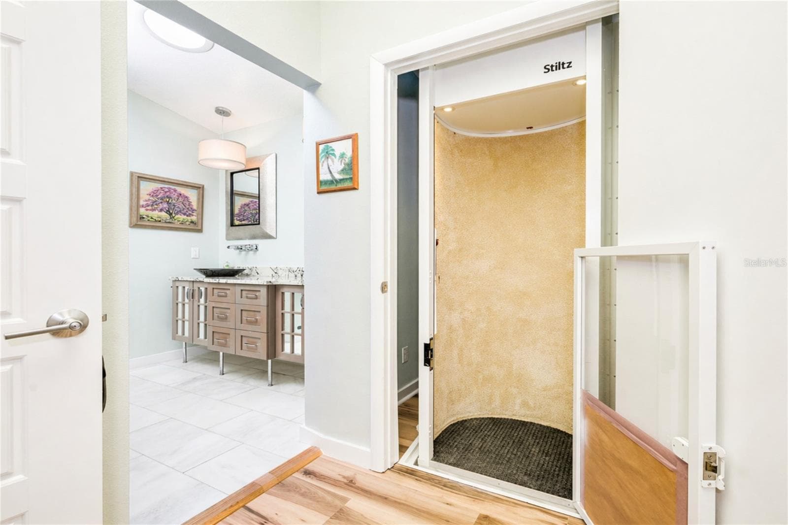 Stiltz elevator. - 1504 N ATLANTIC AVE, DAYTONA BEACH