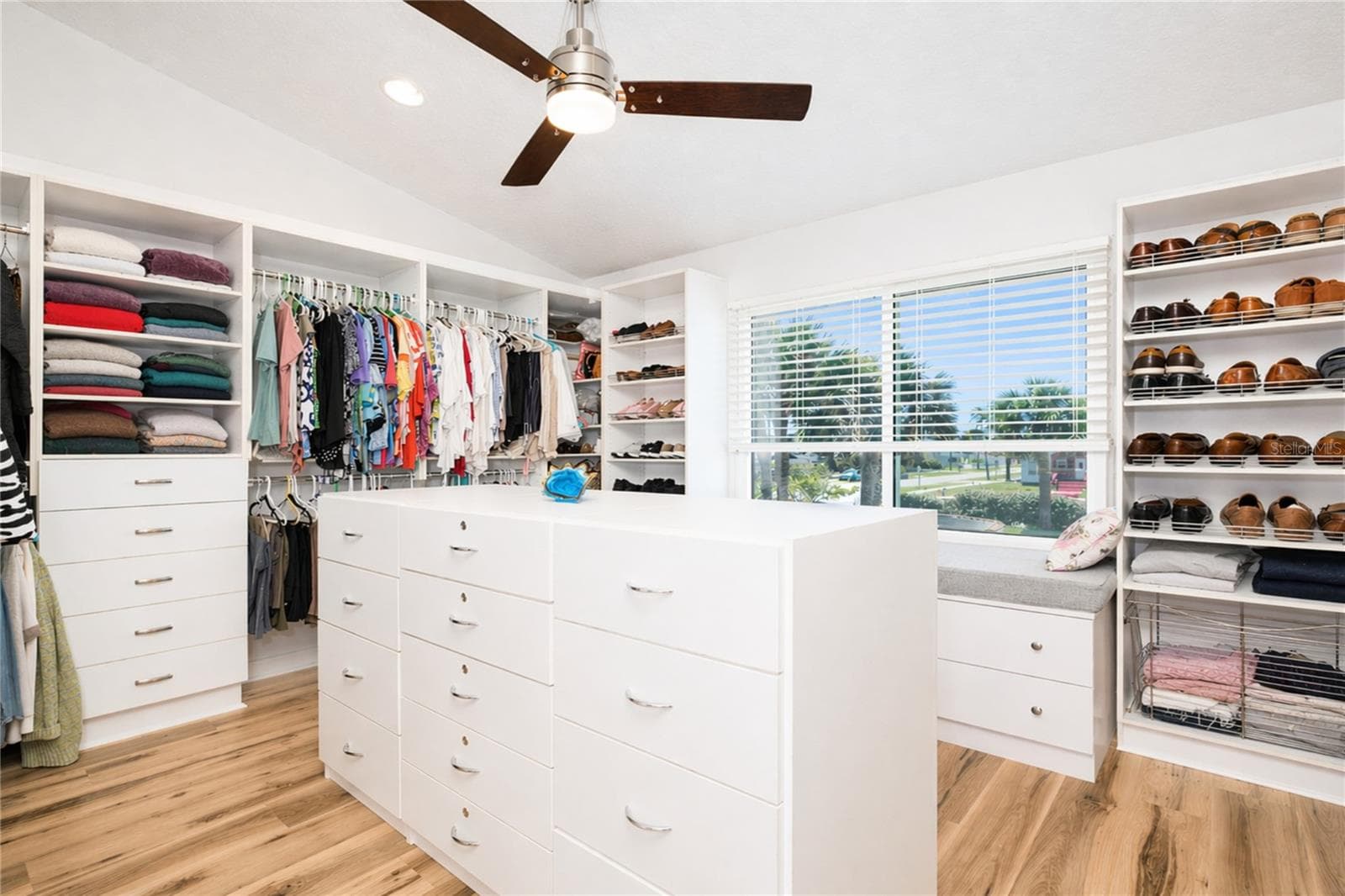 Primary suite walk-in closet. - 1504 N ATLANTIC AVE, DAYTONA BEACH
