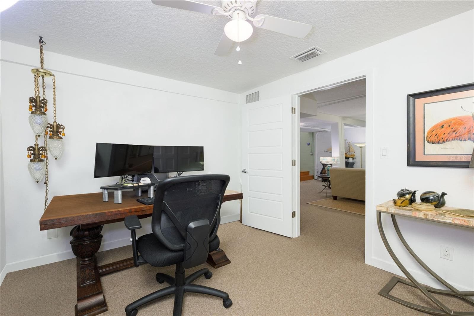 Lower level bedroom/office. - 1504 N ATLANTIC AVE, DAYTONA BEACH