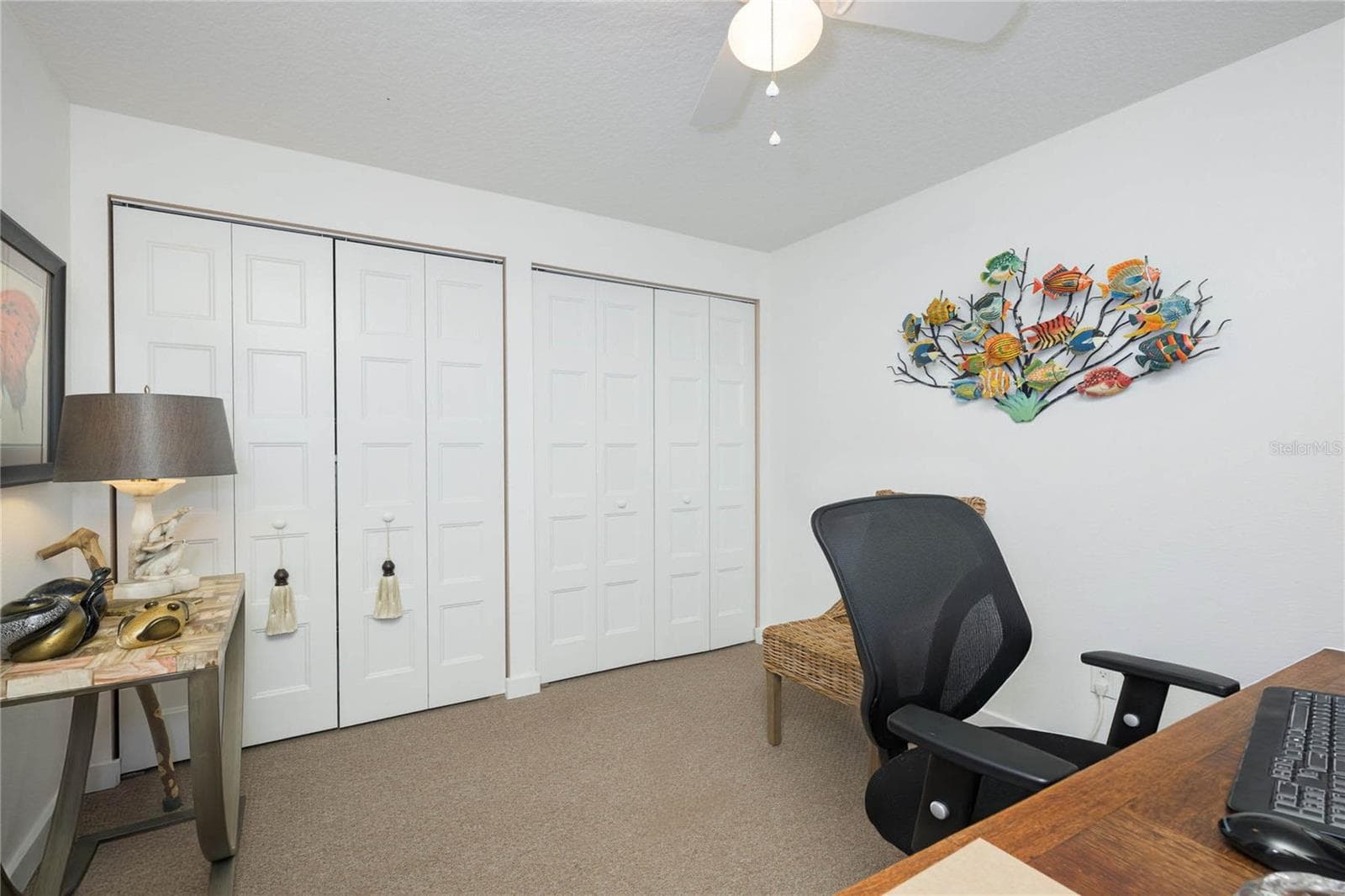 Lower level bedroom/office. - 1504 N ATLANTIC AVE, DAYTONA BEACH