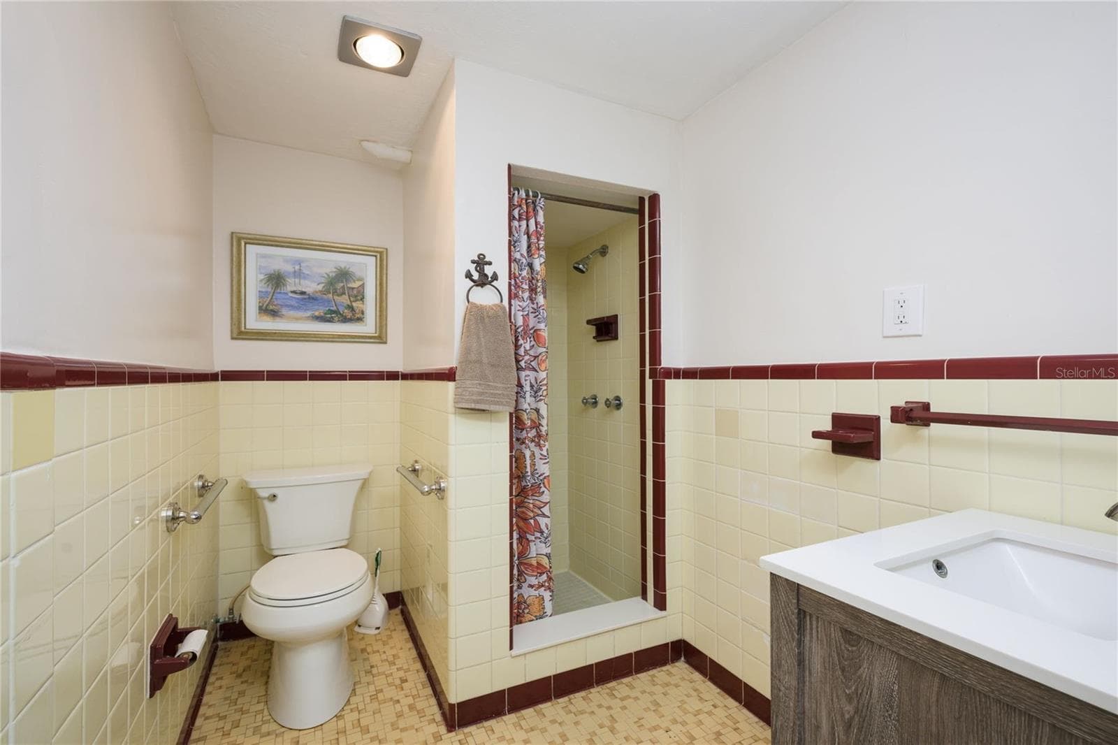 Lower level: The only room preserved from the original home, offering a sense of nostalgia and timeless charm. Beautifully maintained and thoughtfully kept true to its original debut, it stands as a rare and authentic reflection of the home’s history. - 1504 N ATLANTIC AVE, DAYTONA BEACH