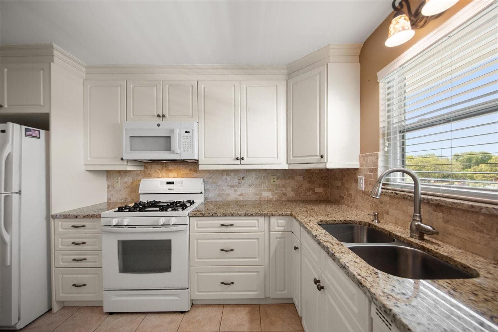 Plenty of prep room in this kitchen and excellent appliances - 5970 80TH ST N #411, ST PETERSBURG