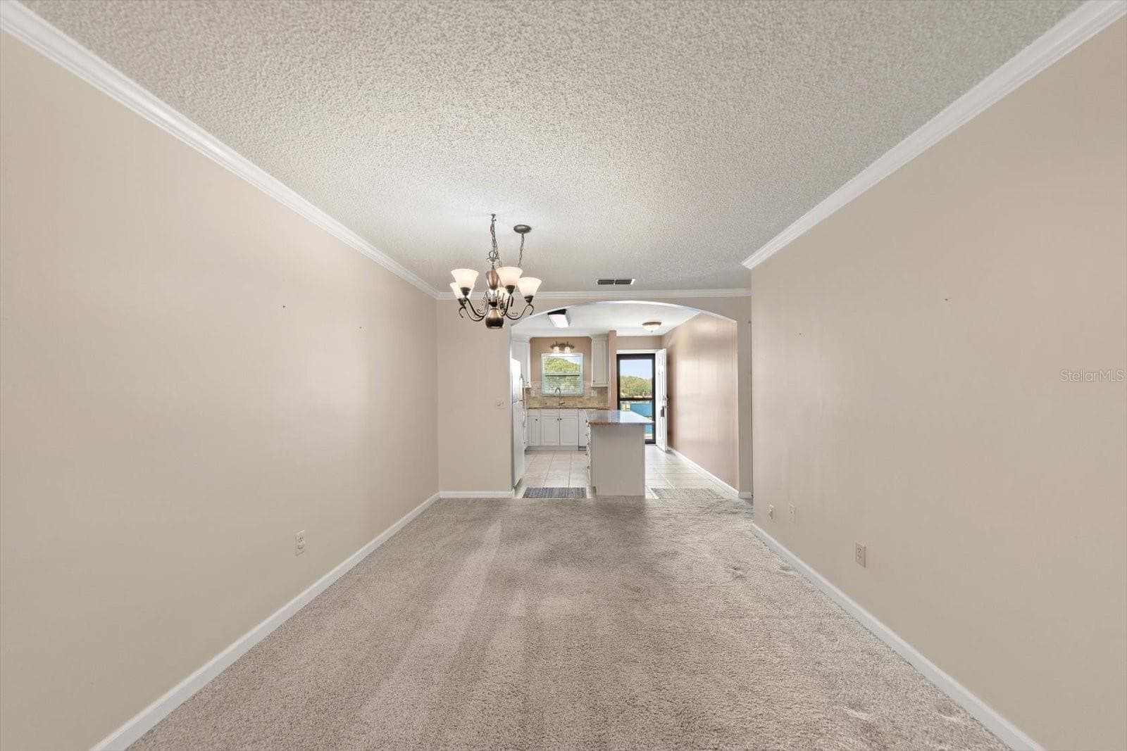 Dining Room with crown molding - 5970 80TH ST N #411, ST PETERSBURG