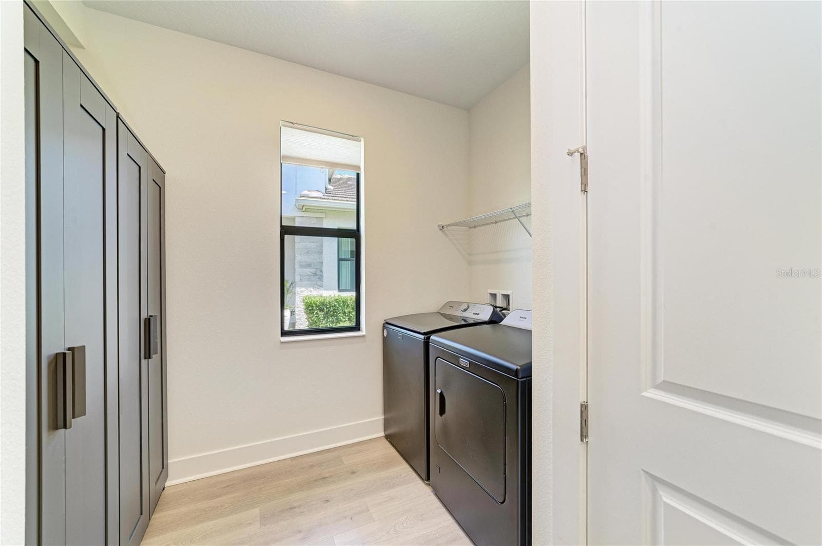 Laundry Roon with Upgrded cabinets - 5290 BARNETT CIR, BRADENTON