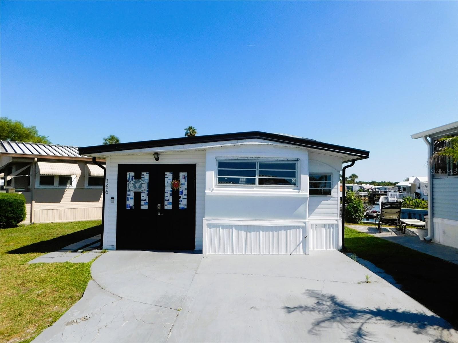Manufactured Home at 9000 US HIGHWAY 192 #166, CLERMONT, photo 2 of 66
