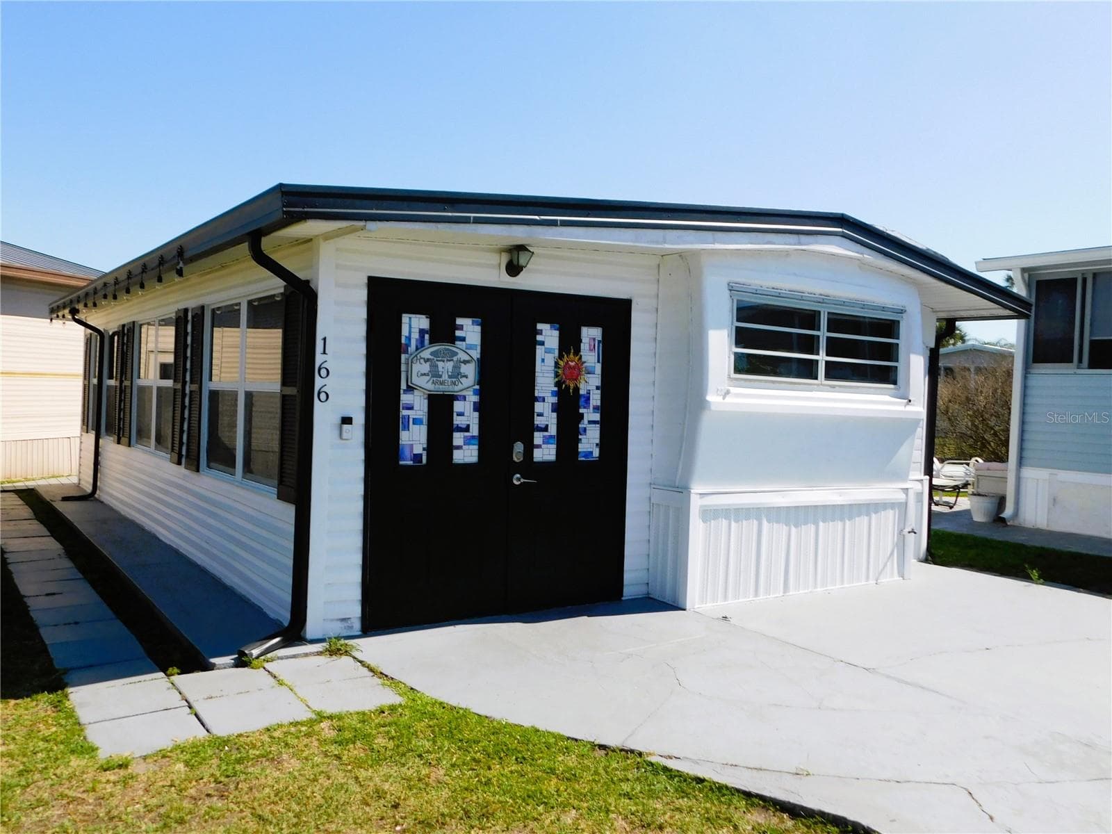 Manufactured Home at 9000 US HIGHWAY 192 #166, CLERMONT, photo 3 of 66