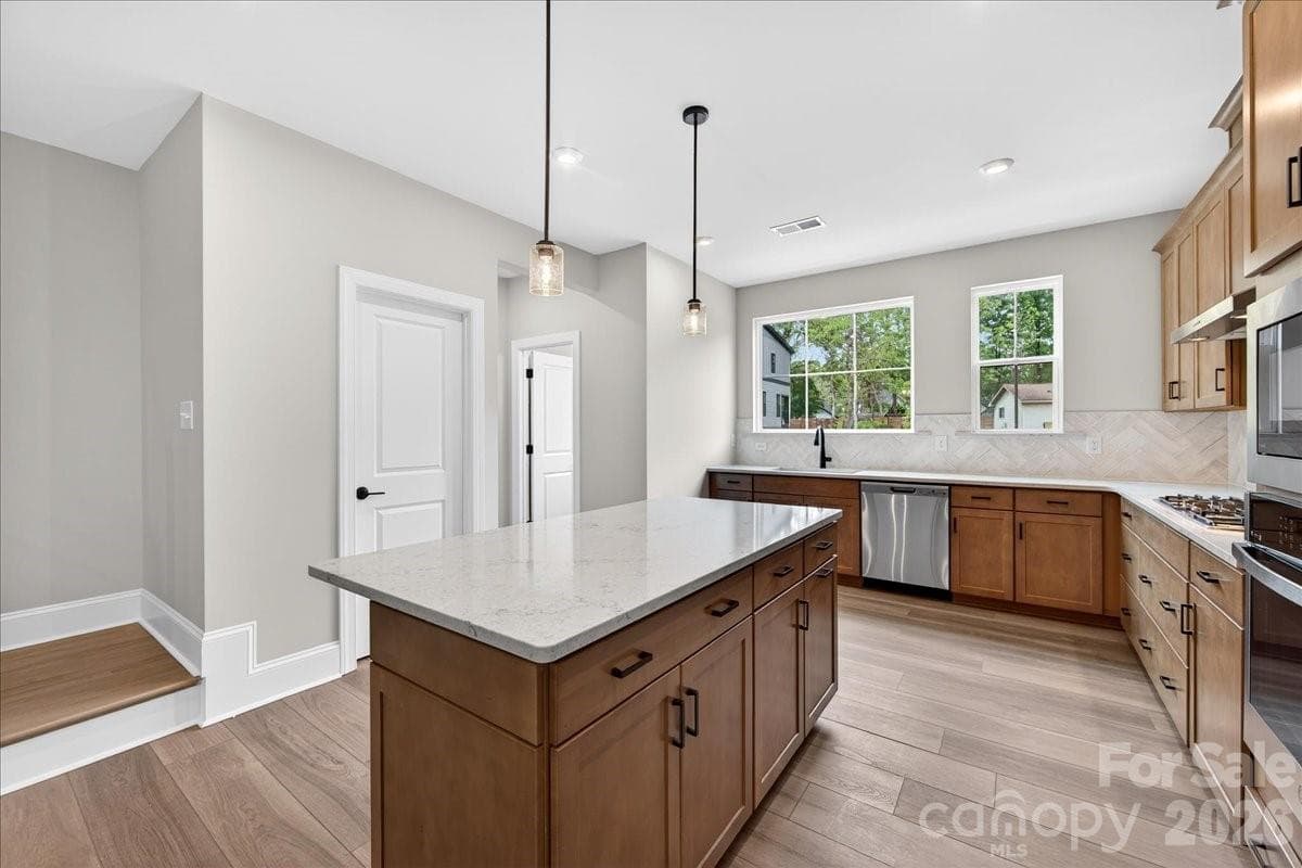 Gourmet kitchen - 420 Old Town Village Road, Waxhaw