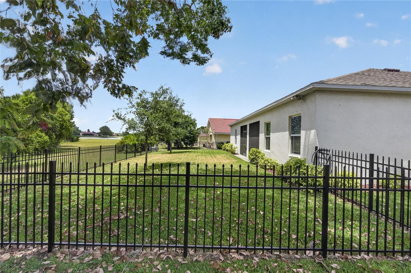 Fenced in backyard to keep the children or dogs safe - 2423 MALAYA CT, PUNTA GORDA