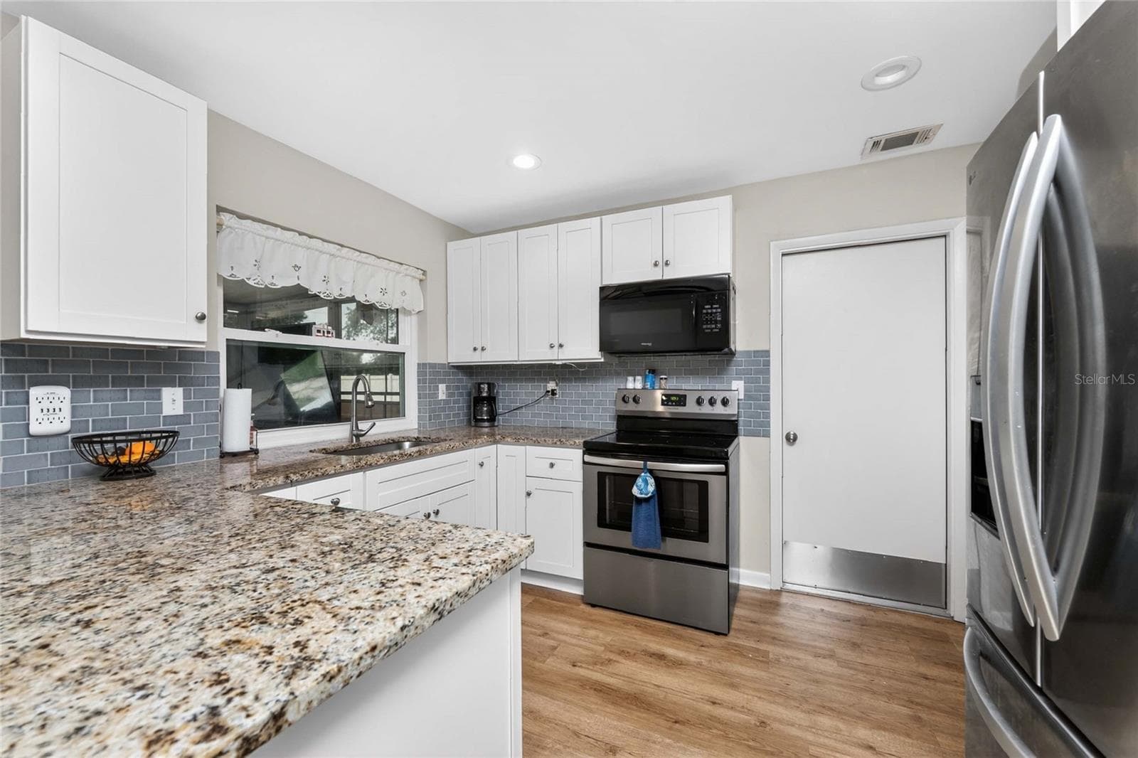 Single Family Residence at 557 MAGNOLIA AVE NW, PORT CHARLOTTE, photo 11 of 43
