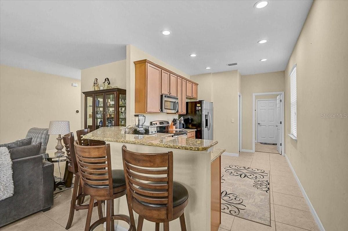 Single Family Residence at 9815 NOSTALGIA PL, ENGLEWOOD, photo 16 of 37