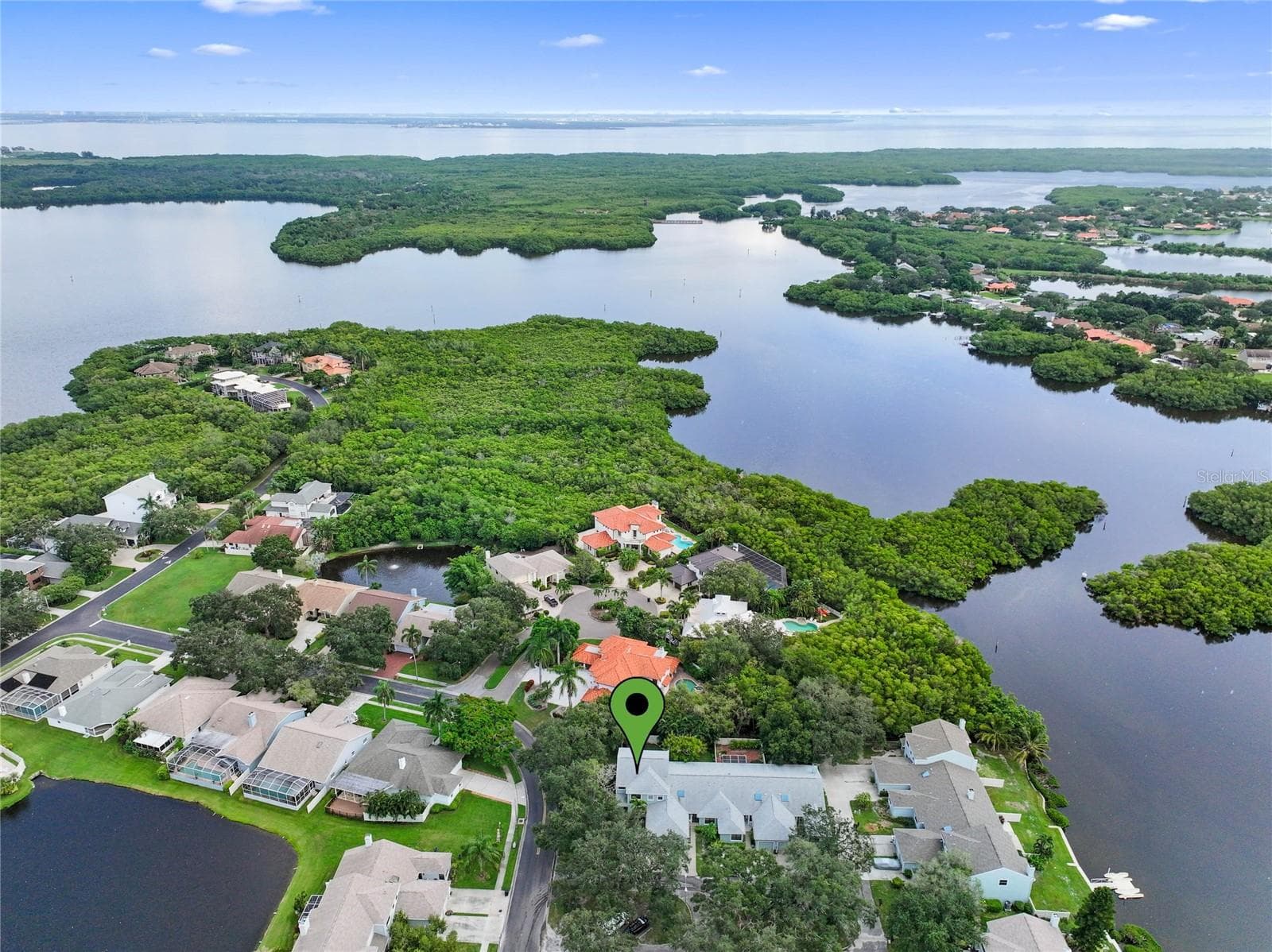 Waterfront Preserve Community of gated and private Caya Costa is a serene setting - 1092 SANABEL CT NE, ST PETERSBURG