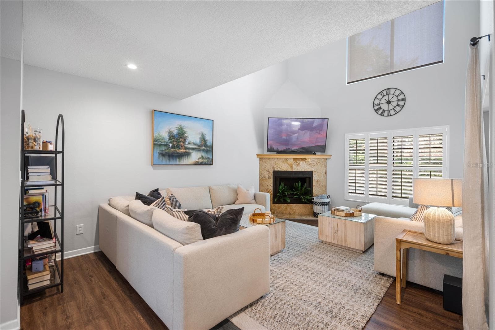 Homeowner's Cozy Living Space with Soaring Ceilings and lots of Natural Sunlight.  Wood Burning Fireplace for cool nights - 1092 SANABEL CT NE, ST PETERSBURG
