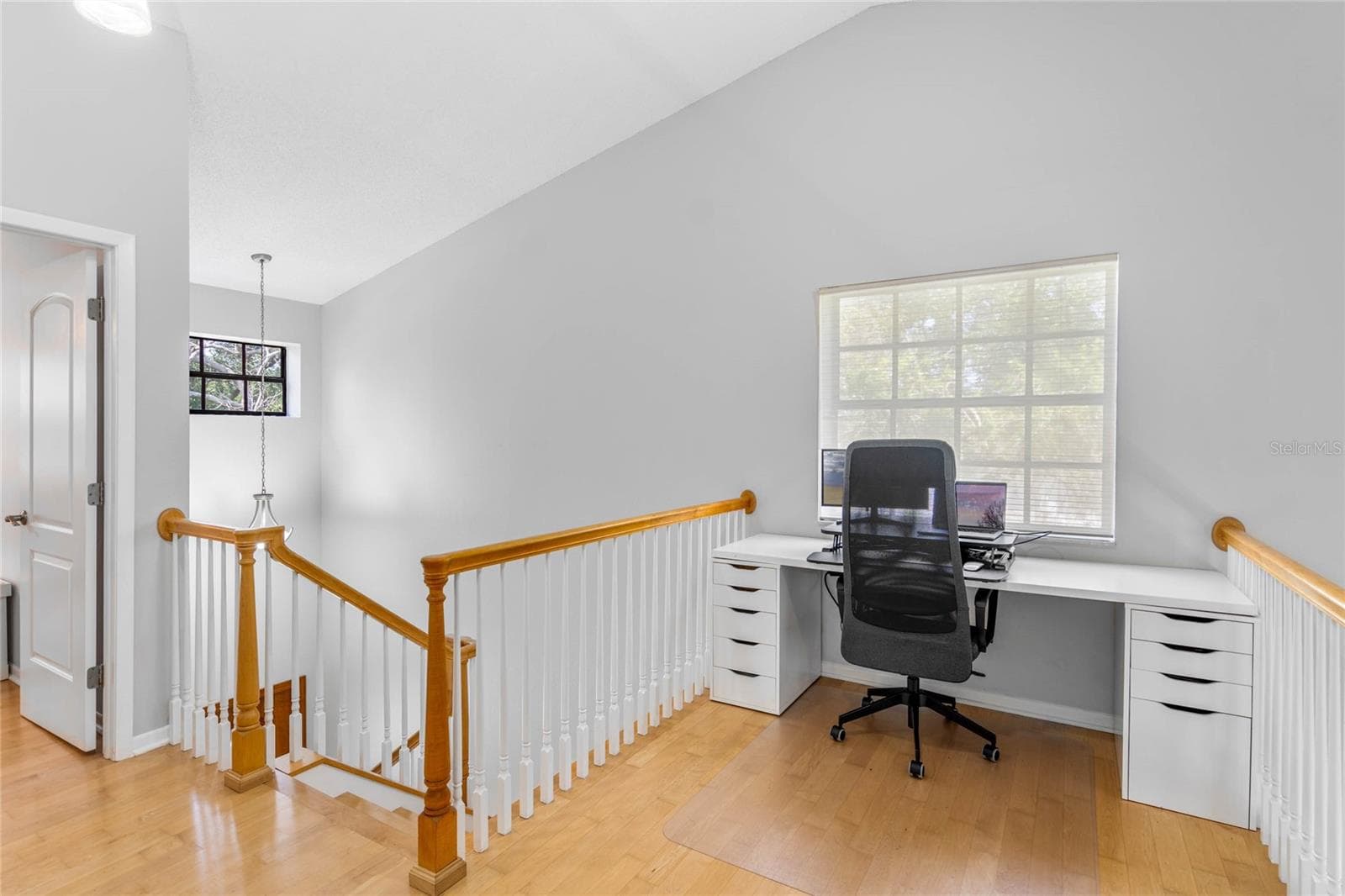 Cool additional Loft office workspace.  Great view of the oak trees and neighborhood. - 1092 SANABEL CT NE, ST PETERSBURG