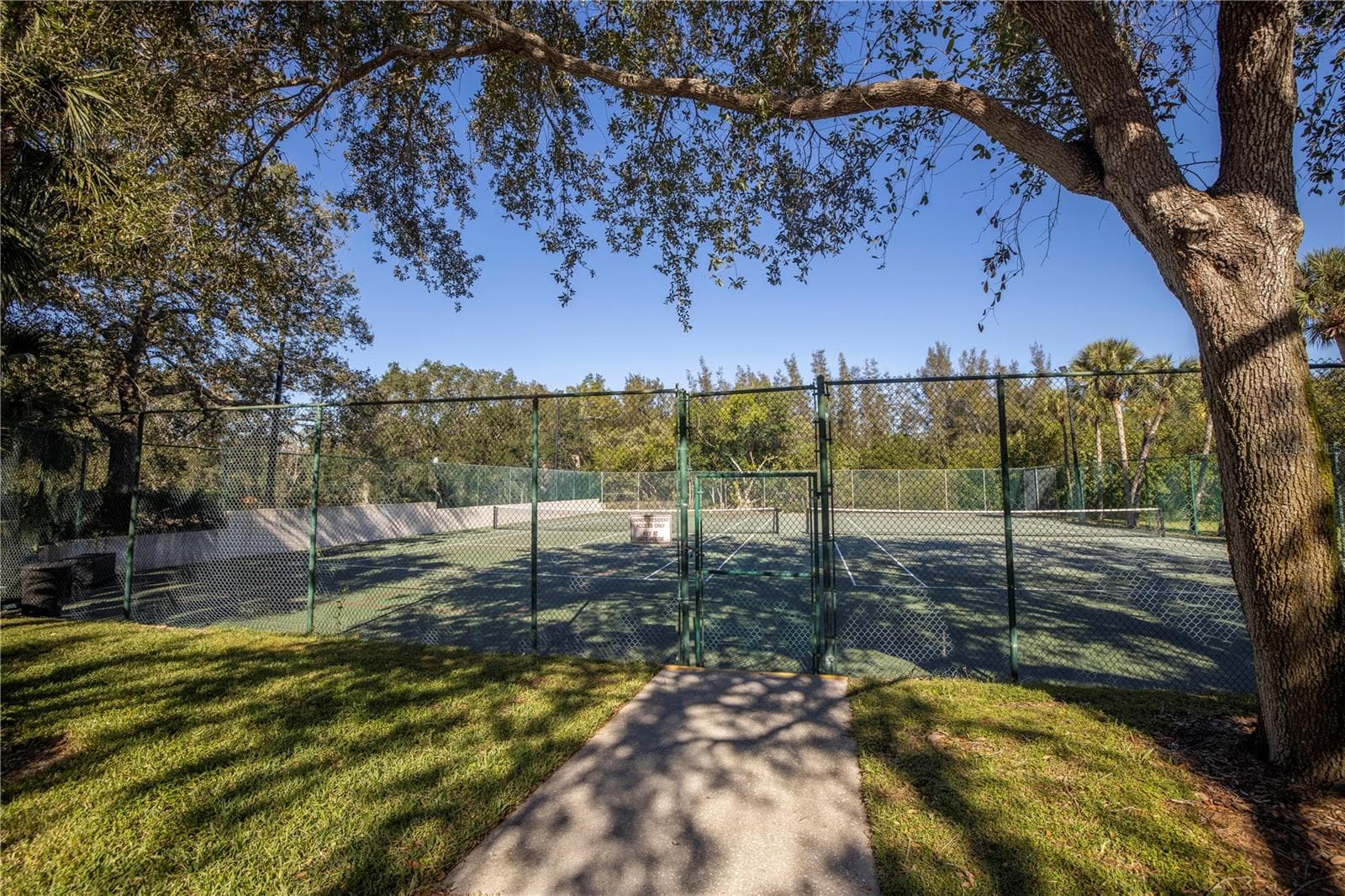 Courts are lighted for cooler evening Sports - 1092 SANABEL CT NE, ST PETERSBURG
