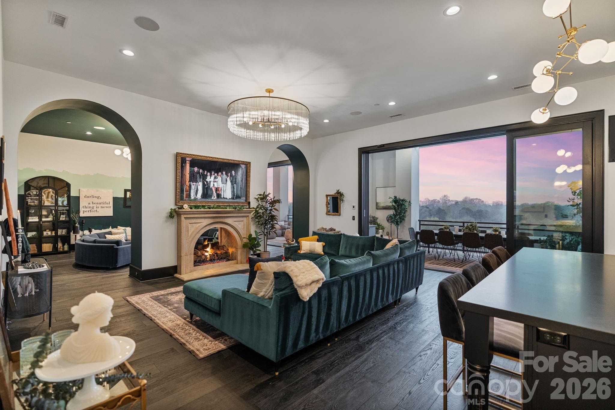 Dual archways lead from the living room into the lounge. - Cornelius