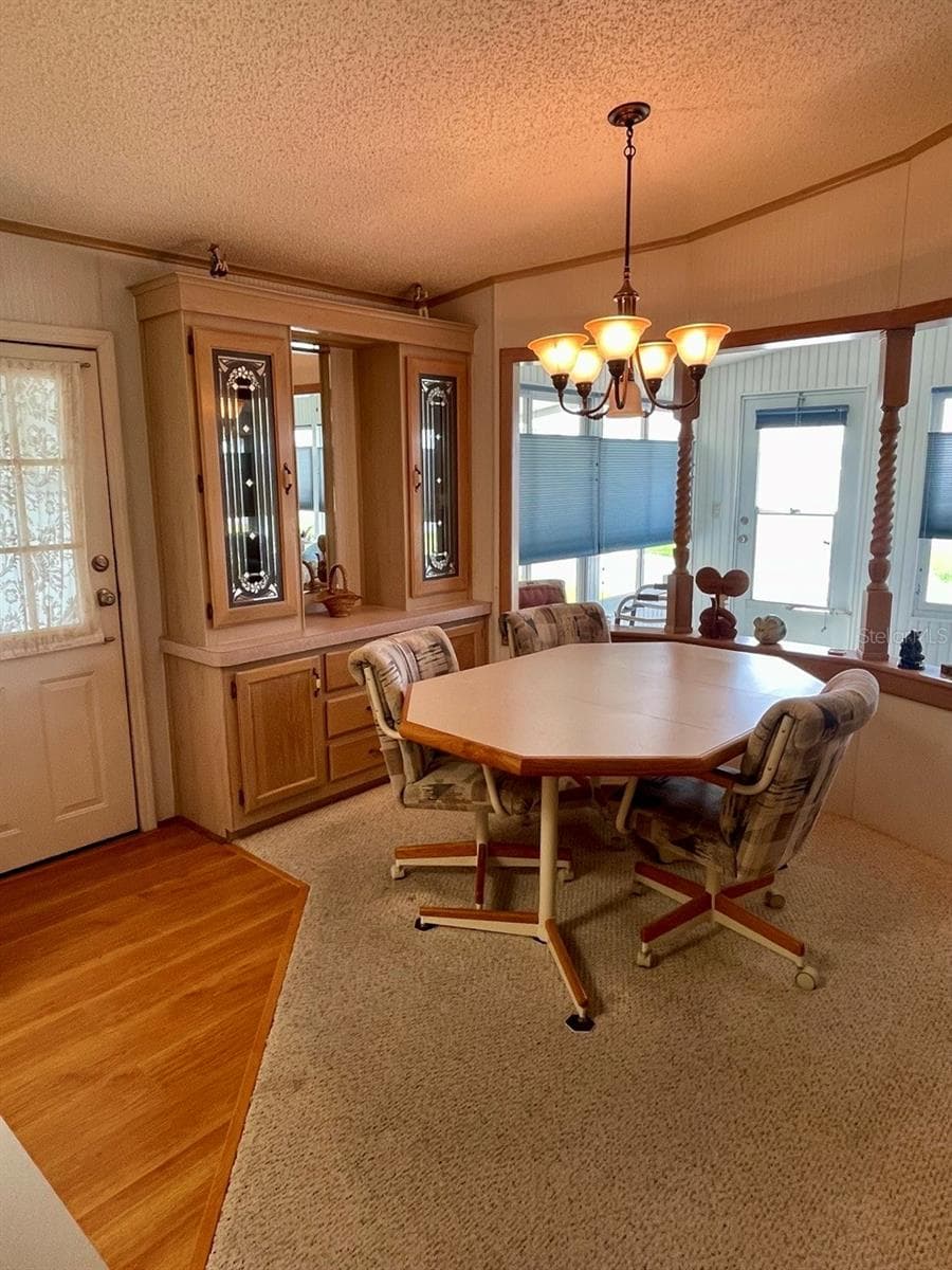 Dining room with opening to florida room - 152 SHADY LN #152, PALMETTO