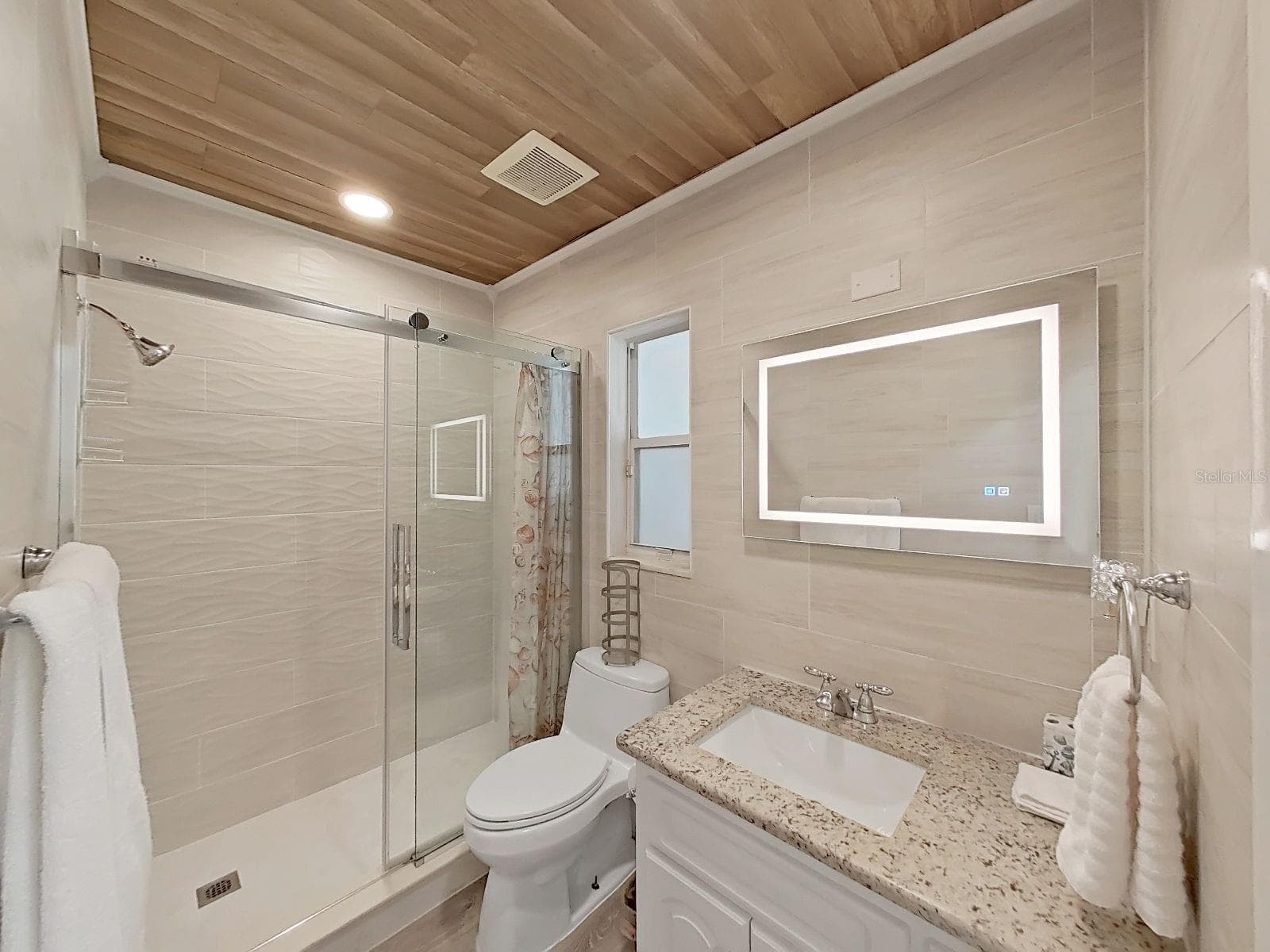 new remolded primary bathroom - 7608 BARRY RD, TAMPA