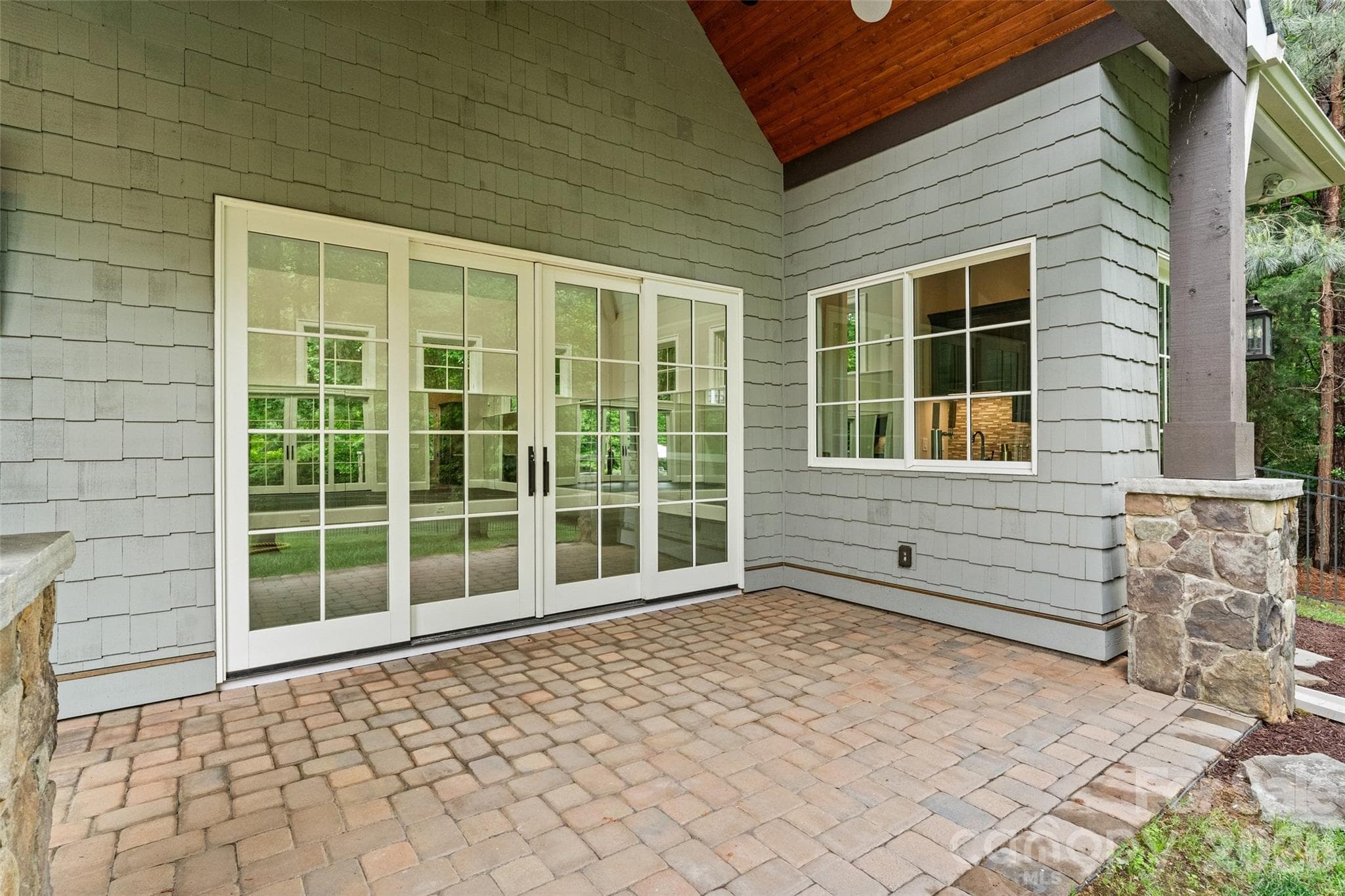 Patio (accessible from gym and pool) - 9105 Island Point Road, Charlotte